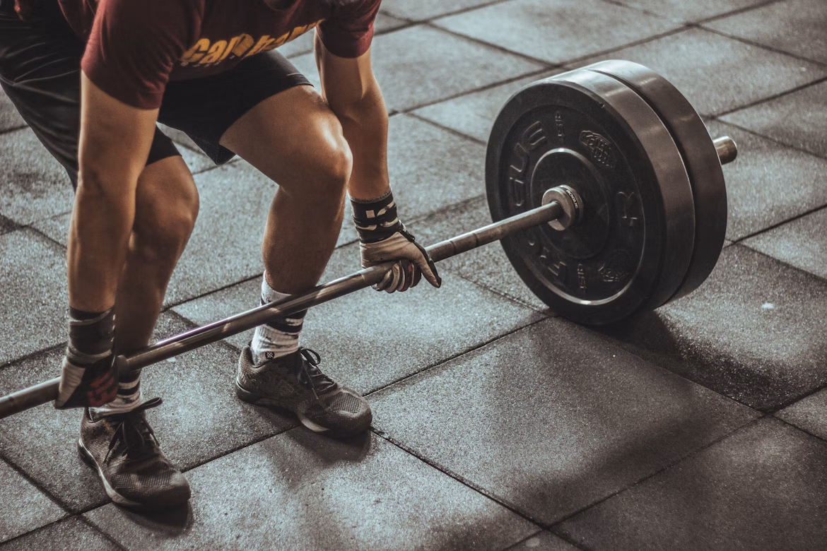 man doing strength training - mistakes could happen from wrong form