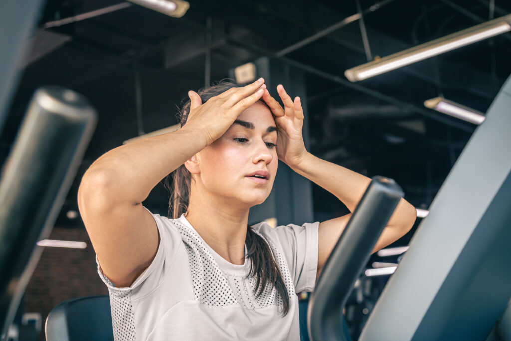 woman feeling signs of overtraining
