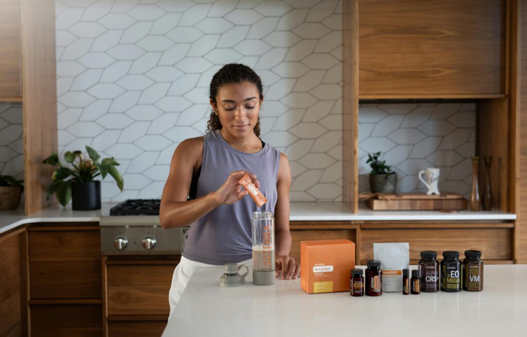woman preparing for her pre-workout daily supplement