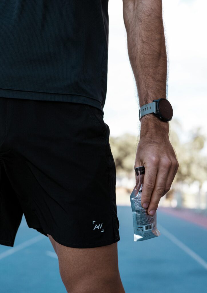 guy carrying energy gels for running