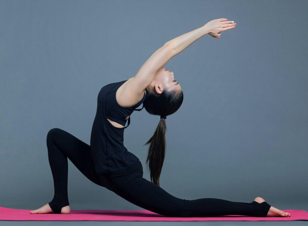 woman doing stretches and warm ups to improve range of motion and flexibility