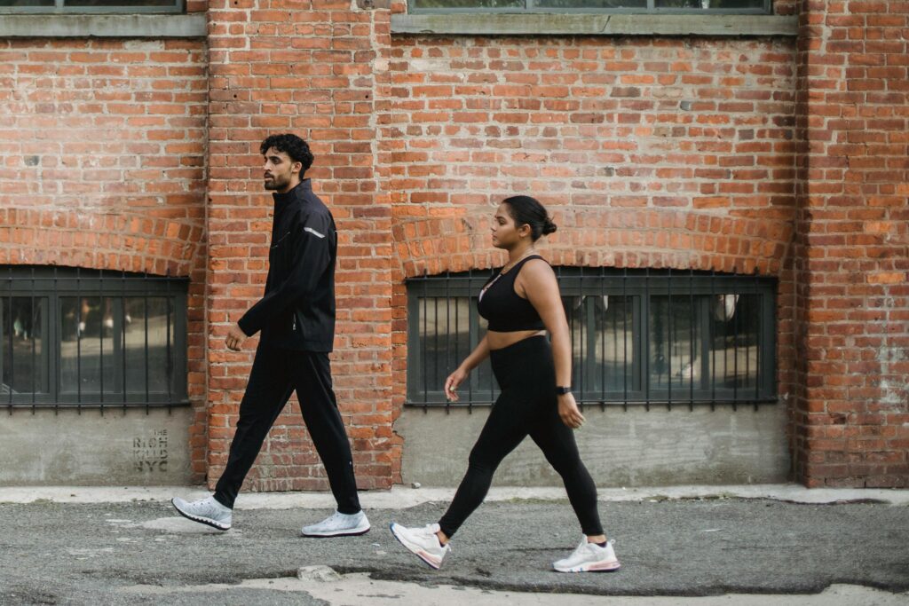 two people walking on a different pace - whats the best walking pace for weight loss
