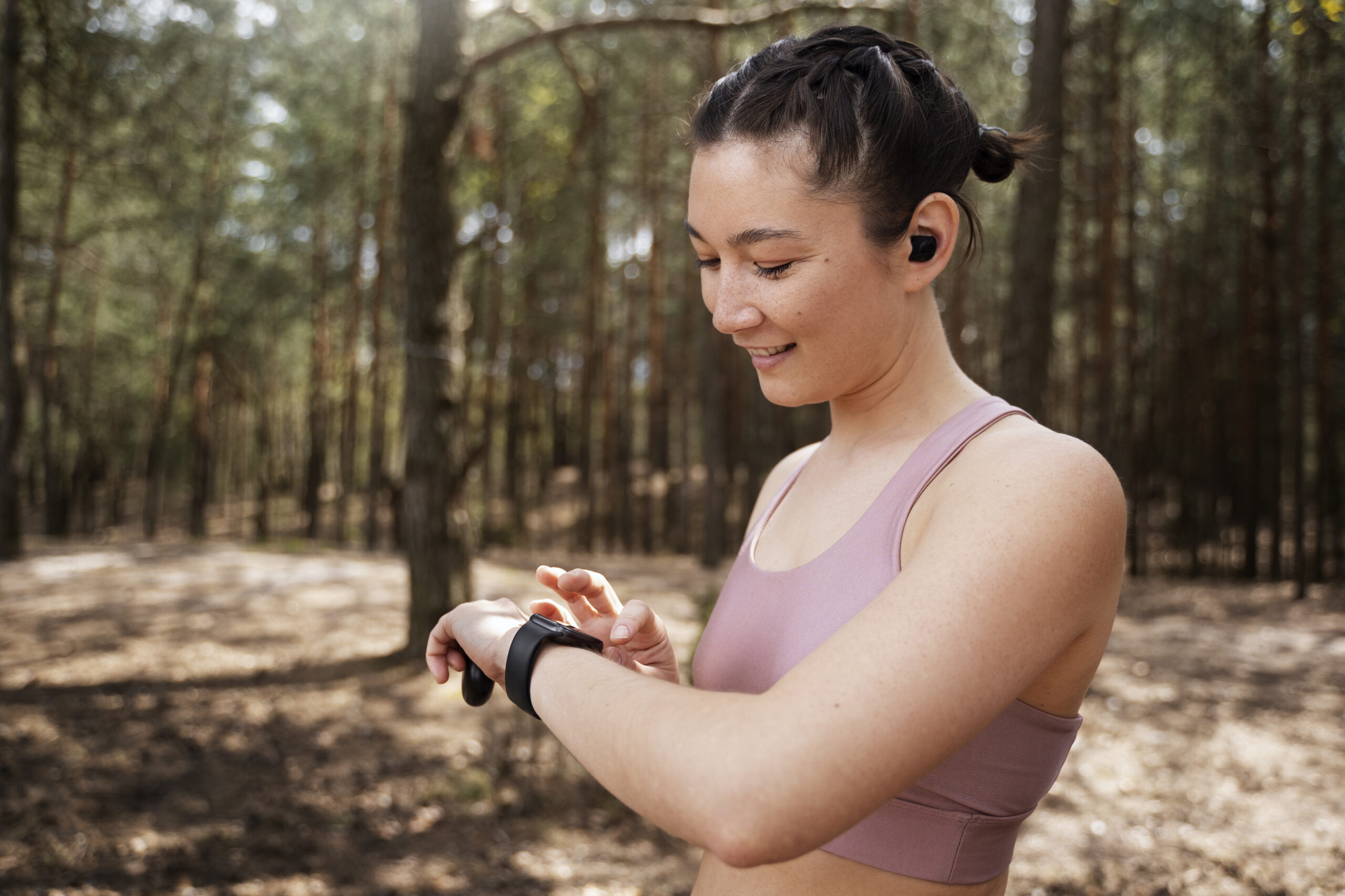 woman checking her watch - how to track walking progress for weight loss